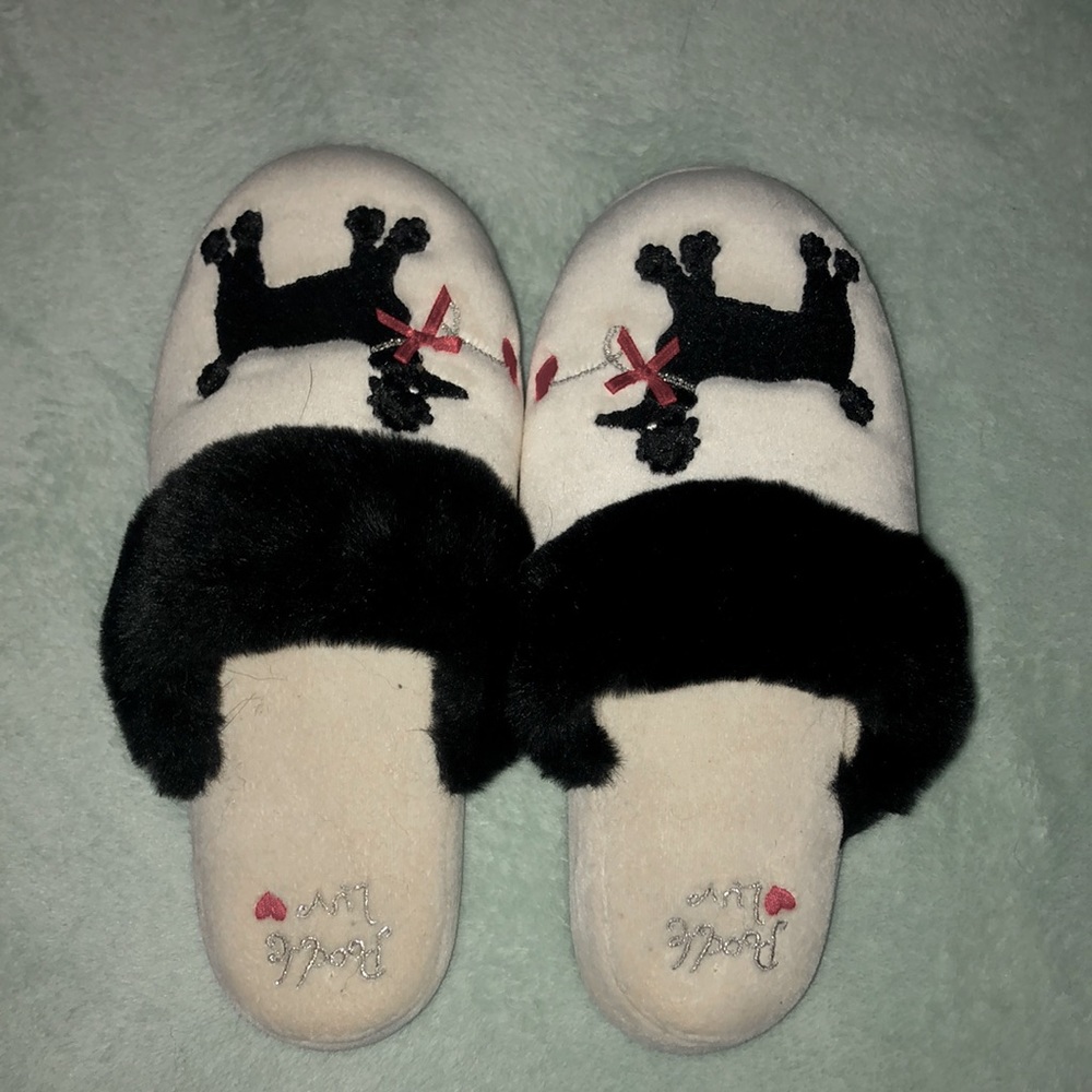 white and black slippers